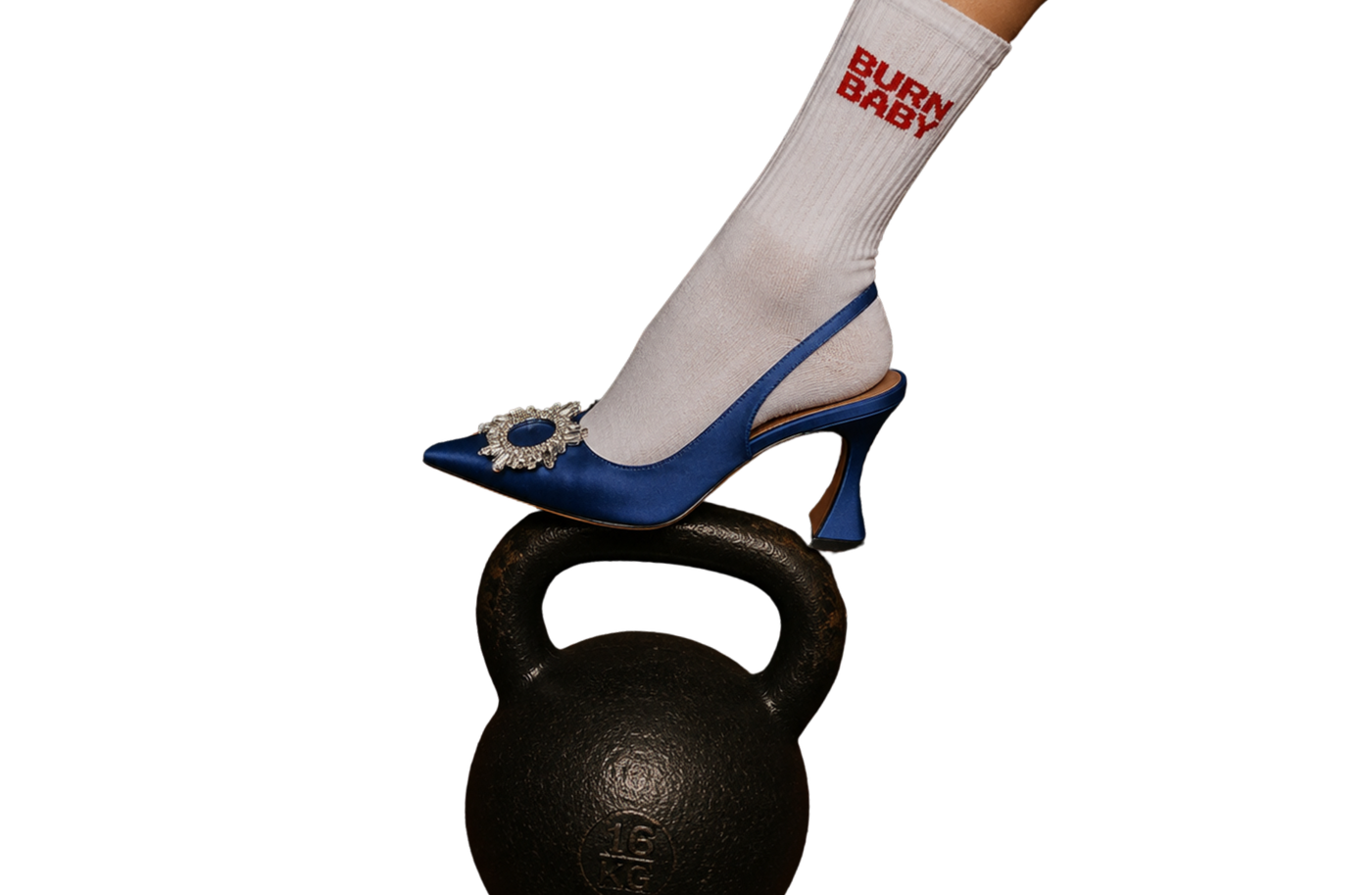 Foot in a Burn Baby sock and blue high heel resting on a kettlebell
